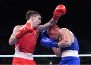 16 August 2016; Michael Conlan of Ireland, left, exchanges punches with Vladimir Nikitin of Russia during their Bantamweight quarter final bout at the Riocentro Pavillion 6 Arena during the 2016 Rio Summer Olympic Games in Rio de Janeiro, Brazil. Photo by Stephen McCarthy/Sportsfile