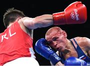 16 August 2016; Vladimir Nikitin of Russia, right, exchanges punches with Michael Conlan of Ireland during their Bantamweight quarter final bout at the Riocentro Pavillion 6 Arena during the 2016 Rio Summer Olympic Games in Rio de Janeiro, Brazil. Photo by Stephen McCarthy/Sportsfile