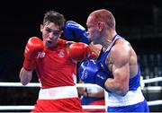 16 August 2016; Vladimir Nikitin of Russia, right, exchanges punches with Michael Conlan of Ireland during their Bantamweight quarter final bout at the Riocentro Pavillion 6 Arena during the 2016 Rio Summer Olympic Games in Rio de Janeiro, Brazil. Photo by Stephen McCarthy/Sportsfile