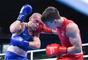 16 August 2016; Vladimir Nikitin of Russia, left, exchanges punches with Michael Conlan of Ireland during their Bantamweight quarter final bout at the Riocentro Pavillion 6 Arena during the 2016 Rio Summer Olympic Games in Rio de Janeiro, Brazil. Photo by Stephen McCarthy/Sportsfile