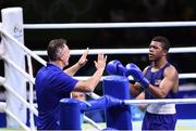 16 August 2016; Gary Russell of USA, with team USA boxing coach Billy Walsh during his Light Welterweight Quarterfinal bout with Fazliddin Gaibnazarov of Uzbekistan at the Riocentro Pavillion 6 Arena during the 2016 Rio Summer Olympic Games in Rio de Janeiro, Brazil. Photo by Stephen McCarthy/Sportsfile