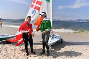 16 August 2016; Annalise Murphy of Ireland, right, and Anne-Marie Rindom of Denmark celebrate winning silver  and bronze respectively in the Women's Laser Radial Medal race on the Pão de Açúcar course, Copacabana, during the 2016 Rio Summer Olympic Games in Rio de Janeiro, Brazil. Photo by Brendan Moran/Sportsfile
