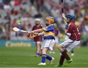 14 August 2016; Saoirse Keating, Sisters of Charity, Clonmel, Co Tipperary in action against Éadaoin Ó Snodaigh, Gaelscoil Inse Chór, Áth Cliath, representing Galway, during the INTO Cumann na mBunscol GAA Respect Exhibition Go Games at the GAA Hurling All-Ireland Senior Championship Semi-Final game between Galway and Tipperary at Croke Park, Dublin. Photo by Ray McManus/Sportsfile