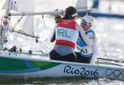 16 August 2016; Annalise Murphy of Ireland embraces Anne-Marie Rindom of Denmark after the Women's Laser Radial Medal race on the Pao de Acucar course, Copacabana, during the 2016 Rio Summer Olympic Games in Rio de Janeiro, Brazil. Photo by David Branigan/Sportsfile