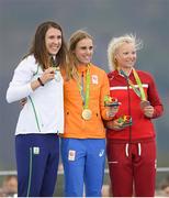 16 August 2016; Annalise Murphy of Ireland on the podium with her silver medal along with Marit Bouwmeester of the Netherlands who won gold and Anne-Marie Rindom of Denmark who took bronze  after the Women's Laser Radial Medal race on the Pão de Açúcar course, Copacabana, during the 2016 Rio Summer Olympic Games in Rio de Janeiro, Brazil. Photo by Ramsey Cardy/Sportsfile
