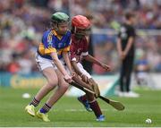 14 August 2016; Emma Byrne, Scoil Bhríde, Cannistown, Navan, Co Meath, representing Tipperary, in action against Alicia Olaniran, Scoil Iosaf NS, Castlemartyr, Co Cork representing Galway, during the INTO Cumann na mBunscol GAA Respect Exhibition Go Games at the GAA Hurling All-Ireland Senior Championship Semi-Final game between Galway and Tipperary at Croke Park, Dublin. Photo by Ray McManus/Sportsfile