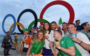 16 August 2016; Annalise Murphy of Ireland celebrates with her sister Claudine and brother Finn and friends after winning a silver medal in the Women's Laser Radial Medal race on the Pão de Açúcar course, Copacabana, during the 2016 Rio Summer Olympic Games in Rio de Janeiro, Brazil. Photo by Brendan Moran/Sportsfile