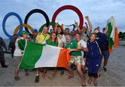 16 August 2016; Annalise Murphy of Ireland celebrates with family and friends after winning a silver medal in the Women's Laser Radial Medal race on the Pão de Açúcar course, Copacabana, during the 2016 Rio Summer Olympic Games in Rio de Janeiro, Brazil. Photo by Brendan Moran/Sportsfile