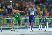 16 August 2016; Ronnie Ash, right, of USA and Balazs Baji of Hungary competing in the Men's 110m Hurdles Semi Final at the Olympic Stadium during the 2016 Rio Summer Olympic Games in Rio de Janeiro, Brazil. Photo by Ramsey Cardy/Sportsfile