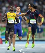 16 August 2016; Omar McLeod of Jamaica is congratulated by Pascal Martinot-Lagarde of France following the Men's 110m Hurdles Semi Final at the Olympic Stadium during the 2016 Rio Summer Olympic Games in Rio de Janeiro, Brazil. Photo by Ramsey Cardy/Sportsfile
