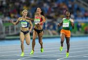16 August 2016; Race winner Marie-Josee Talou, right, of Ivory Coast and second placed Ivet Lalova-Collio of Bulgaria following the Women's 200m Semifinal at the Olympic Stadium during the 2016 Rio Summer Olympic Games in Rio de Janeiro, Brazil. Photo by Ramsey Cardy/Sportsfile