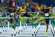 16 August 2016; Omar McLeod, centre, of Jamaica on his way to winning the Men's 110m Hurdles Final at the Olympic Stadium during the 2016 Rio Summer Olympic Games in Rio de Janeiro, Brazil. Photo by Ramsey Cardy/Sportsfile