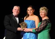 6 November 2010; Shona Curran, Waterford, is presented with her 2010 Camogie Soaring Star award by Cormac Farrell, Marketing Director, O'Neills, and President of the Camogie Association Joan O' Flynn at the 2010 Camogie All-Stars in association with O’Neills. Citywest Hotel, Saggart, Co. Dublin. Picture credit: Stephen McCarthy / SPORTSFILE