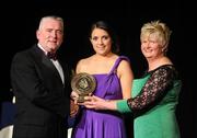 6 November 2010; Regina Gorman, Kildare, is presented with her 2010 Camogie Soaring Star award by Cormac Farrell, Marketing Director, O'Neills, and President of the Camogie Association Joan O' Flynn at the 2010 Camogie All-Stars in association with O’Neills. Citywest Hotel, Saggart, Co. Dublin. Picture credit: Stephen McCarthy / SPORTSFILE