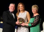 6 November 2010; Fionnula Carr, Down, is presented with her 2010 Camogie Soaring Star award by Cormac Farrell, Marketing Director, O'Neills, and President of the Camogie Association Joan O' Flynn at the 2010 Camogie All-Stars in association with O’Neills. Citywest Hotel, Saggart, Co. Dublin. Picture credit: Stephen McCarthy / SPORTSFILE
