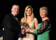 6 November 2010; Jane Dolan, Meath, is presented with her 2010 Camogie Soaring Star award by Cormac Farrell, Marketing Director, O'Neills and President of the Camogie Association Joan O' Flynn at the 2010 Camogie All-Stars in association with O’Neills. Citywest Hotel, Saggart, Co. Dublin. Picture credit: Stephen McCarthy / SPORTSFILE