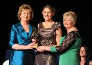 6 November 2010; Brenda Hanney, Galway, is presented with her 2010 Camogie All-Star award by President Mary McAleese and President of the Camogie Association Joan O' Flynn at the 2010 Camogie All-Stars in association with O’Neills. Citywest Hotel, Saggart, Co. Dublin. Picture credit: Stephen McCarthy / SPORTSFILE