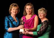 6 November 2010; Aislinn Connolly, Galway, is presented with her 2010 Camogie All-Star award by  President Mary McAleese and President of the Camogie Association Joan O' Flynn at the 2010 Camogie All-Stars in association with O’Neills. Citywest Hotel, Saggart, Co. Dublin. Picture credit: Stephen McCarthy / SPORTSFILE