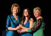6 November 2010; Anne Dalton, Kilkenny, is presented with her 2010 Camogie All-Star award by President Mary McAleese and President of the Camogie Association Joan O' Flynn at the 2010 Camogie All-Stars in association with O’Neills. Citywest Hotel, Saggart, Co. Dublin. Picture credit: Stephen McCarthy / SPORTSFILE
