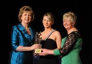6 November 2010; Orla Kilkenny, Galway, is presented with her 2010 Camogie All-Star award by President Mary McAleese and President of the Camogie Association Joan O' Flynn at the 2010 Camogie All-Stars in association with O’Neills. Citywest Hotel, Saggart, Co. Dublin. Picture credit: Stephen McCarthy / SPORTSFILE