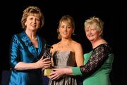 6 November 2010; Regina Glynn, Galway, is presented with her 2010 Camogie All-Star award by President Mary McAleese and President of the Camogie Association Joan O' Flynn at the 2010 Camogie All-Stars in association with O’Neills. Citywest Hotel, Saggart, Co. Dublin. Picture credit: Stephen McCarthy / SPORTSFILE