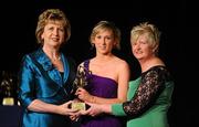 6 November 2010; Niamh Kilkenny, Galway, is presented with her 2010 Camogie All-Star award by President Mary McAleese and President of the Camogie Association Joan O' Flynn at the 2010 Camogie All-Stars in association with O’Neills. Citywest Hotel, Saggart, Co. Dublin. Picture credit: Stephen McCarthy / SPORTSFILE