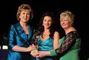 6 November 2010; Claire O'Connor, Wexford, is presented with her 2010 Camogie All-Star award by President Mary McAleese and President of the Camogie Association Joan O' Flynn at the 2010 Camogie All-Stars in association with O’Neills. Citywest Hotel, Saggart, Co. Dublin. Picture credit: Stephen McCarthy / SPORTSFILE