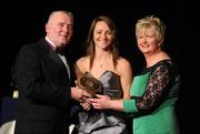 6 November 2010; Jane Adams, Antrim, is presented with her 2010 Camogie Soaring Star award by President of the Camogie Association Joan O' Flynn and Cormac Farrell, Marketing Director, O'Neills, at the 2010 Camogie All-Stars in association with O’Neills. Citywest Hotel, Saggart, Co. Dublin. Picture credit: Stephen McCarthy / SPORTSFILE
