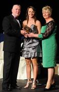 6 November 2010; Jane Adams, Antrim, is presented with her 2010 Camogie Soaring Star award by Cormac Farrell, Marketing Director, O'Neills, and President of the Camogie Association Joan O' Flynn at the 2010 Camogie All-Stars in association with O’Neills. Citywest Hotel, Saggart, Co. Dublin. Picture credit: Stephen McCarthy / SPORTSFILE