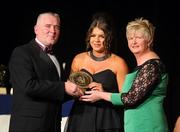 6 November 2010; Shannon Graham, Antrim, is presented with her 2010 Camogie Soaring Star award by President of the Camogie Association Joan O' Flynn and Cormac Farrell, Marketing Director, O'Neills, at the 2010 Camogie All-Stars in association with O’Neills. Citywest Hotel, Saggart, Co. Dublin. Picture credit: Stephen McCarthy / SPORTSFILE
