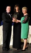 6 November 2010; Michaela Morkan, Offaly, is presented with her 2010 Camogie Intermediate Soaring Star award by Cormac Farrell, Marketing Director, O'Neills and President of the Camogie Association Joan O' Flynn at the 2010 Camogie All-Stars in association with O’Neills. Citywest Hotel, Saggart, Co. Dublin. Picture credit: Stephen McCarthy / SPORTSFILE