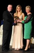 6 November 2010; Jane Dolan, Meath, is presented with her 2010 Camogie Soaring Star award by Cormac Farrell, Marketing Director, O'Neills, and President of the Camogie Association Joan O' Flynn at the 2010 Camogie All-Stars in association with O’Neills. Citywest Hotel, Saggart, Co. Dublin. Picture credit: Stephen McCarthy / SPORTSFILE