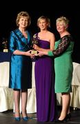 6 November 2010; Niamh Kilkenny, Galway, is presented with her 2010 Camogie All-Star award by President Mary McAleese and President of the Camogie Association Joan O' Flynn at the 2010 Camogie All-Stars in association with O’Neills. Citywest Hotel, Saggart, Co. Dublin. Picture credit: Stephen McCarthy / SPORTSFILE