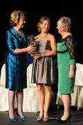6 November 2010; Niamh Glynn, Galway, is presented with her 2010 Camogie All-Star award by President Mary McAleese and President of the Camogie Association Joan O' Flynn at the 2010 Camogie All-Stars in association with O’Neills. Citywest Hotel, Saggart, Co. Dublin. Picture credit: Stephen McCarthy / SPORTSFILE