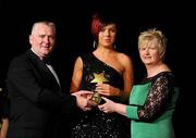 6 November 2010; Sarah Carey, Limerick, is presented with her 2010 Camogie Munster Young Player of the Year award by President of the Camogie Association Joan O' Flynn and Cormac Farrell, Marketing Director, O'Neills, at the 2010 Camogie All-Stars in association with O’Neills. Citywest Hotel, Saggart, Co. Dublin. Picture credit: Stephen McCarthy / SPORTSFILE