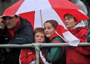 7 November 2010; Spectators shelter from the heavy rain during the game. AIB GAA Football Connacht Club Senior Championship Semi-Final, Killererin v Ballintubber, Tuam Stadium, Tuam, Co. Galway. Picture credit: David Maher / SPORTSFILE