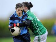 7 November 2010; Ann Marie McGrath, Moyle Rovers, Tipperary, is tackled by Helen Cullinane, Caltra Cuans, Galway. Tesco All-Ireland Junior Ladies Football Club Championship Semi-Final, Caltra Cuans, Galway v Moyle Rovers, Tipperary, Mountbellew, Co. Galway. Picture credit: Matt Browne / SPORTSFILE