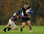 8 November 2010; Tadgh Foley, Ard Scoil na Trionoide, is tackled by Tom Lyons, St. Pauls. Duff Cup 1st Round, Ard Scoil na Trionoide v St. Pauls, Newbridge College, Newbridge, Co. Kildare. Picture credit: Barry Cregg / SPORTSFILE