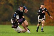 8 November 2010; Tadgh Foley with support from Padraig Dunne, Ard Scoil na Trionoide, is tackled by Tom Lyons, St. Pauls. Duff Cup 1st Round, Ard Scoil na Trionoide v St. Pauls, Newbridge College, Newbridge, Co. Kildare. Picture credit: Barry Cregg / SPORTSFILE