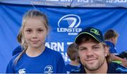 17 August 2016; Leinster's Jordi Murphy with Lucy McCullagh, aged 12, from Monkstown, at the Bank of Ireland Leinster Rugby Camp at Blackrock College RFC, Stradbrook Road, Blackrock, Co Dublin. Photo by Piaras Ó Mídheach/Sportsfile
