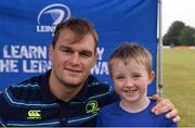17 August 2016; Leinster's Rhys Ruddock with Adam Kiely, age 8, from Blackrock, at the Bank of Ireland Leinster Rugby Camp at Blackrock College RFC, Stradbrook Road, Blackrock, Co Dublin. Photo by Piaras Ó Mídheach/Sportsfile