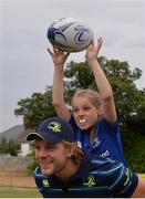 17 August 2016; Leinster Rugby's Jordi Murphy with Lucy McCullagh, aged 12, from Monkstown, at the Bank of Ireland Leinster Rugby Camp at Blackrock College RFC, Stradbrook Road, Blackrock, Co Dublin. Photo by Piaras Ó Mídheach/Sportsfile