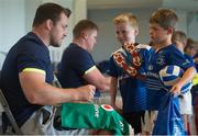 17 August 2016; Leinster Rugby player Cian Healy signing an autograph for Johnathan Sinnott age 11 from Clontarf, Dublin at the Bank of Ireland Leinster Rugby Camp at Clontarf FC, Castle Avenue, Clontarf, Dublin. Photo by Eóin Noonan/Sportsfile