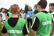 18 August 2016; Dublin senior footballer Denis Bastick speaks with U14s from Fingal Ravens GAA Club during a training session organised by Aer Lingus - Official Airline to Dublin GAA. Fingal Ravens GAA Club were given the opportunity to train with their heroes after being selected as the winner of an Aer Lingus staff competition where employees had the chance to nominate their local GAA club. St. David’s CBS, Artane, Dublin. Photo by Cody Glenn/Sportsfile