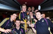 17 March 2009; Kilmacud Crokes players from left, Mark Coughlan, Barry O'Rorke, David Nestor, Cian O'Sullivan, Kevin O'Carroll, Adrian Morrissey, Joe Mooney and Declan Maher celebrate on the team bus after the game. AIB All-Ireland Senior Club Football Championship Final, Crossmaglen Rangers, Co Armagh, v Kilmacud Crokes, Dublin. Croke Park, Dublin. Picture credit: Dáire Brennan / SPORTSFILE