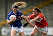 20 August 2016; Donna English of Cavan in action against Annie Walsh of Cork during the TG4 Ladies Football All-Ireland Senior Championship Quarter-Final game between Cavan and Cork at St Brendan's Park in Birr, Co Offaly. Photo by Sam Barnes/Sportsfile