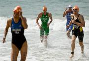 20 August 2016; Aileen Reid, centre, of Ireland competing in the Women's Triathlon at Fort Copacobana during the 2016 Rio Summer Olympic Games in Rio de Janeiro, Brazil. Photo by Ramsey Cardy/Sportsfile