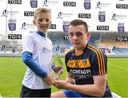 20 August 2016; Stephen Bennett of Waterford is presented with the Bord Gáis Energy Man of the Match award by Conor Maguire, age 7, from Waterford City, who won the honour to present the award through the Bord Gáis Energy Rewards club, following the Bord Gáis Energy GAA Hurling U21 Championship Semi-Final game between Antrim and Waterford at Semple Stadium in Thurles, Co Tipperary. Photo by Piaras Ó Mídheach/Sportsfile