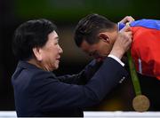 20 August 2016; AIBA President Dr Ching-Kuo Wu presents the Bantamweight gold medal to Robeisy Ramirez of Cuba at the Riocentro Pavillion 6 Arena during the 2016 Rio Summer Olympic Games in Rio de Janeiro, Brazil. Photo by Stephen McCarthy/Sportsfile