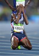 20 August 2016; Mo Farah of Great Britain sinks to his knees after winning the Men's 5000m final in the Olympic Stadium during the 2016 Rio Summer Olympic Games in Rio de Janeiro, Brazil. Photo by Ramsey Cardy/Sportsfile